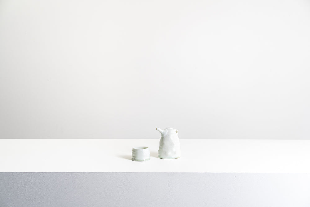 Porcelain Spouted Jug and Cup Set