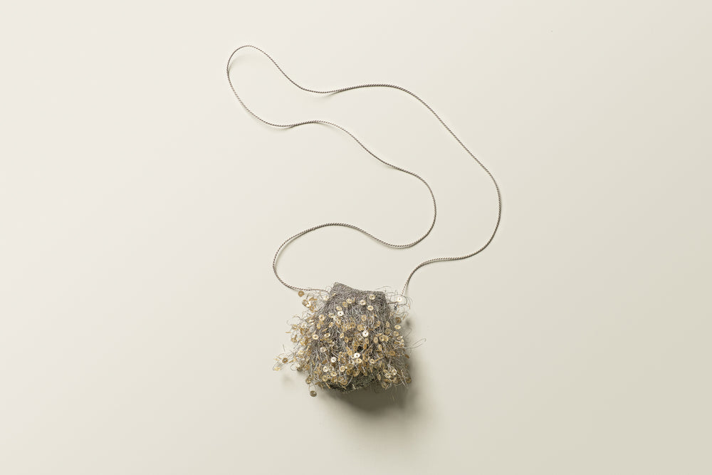 Silver anemone with ni neckpiece